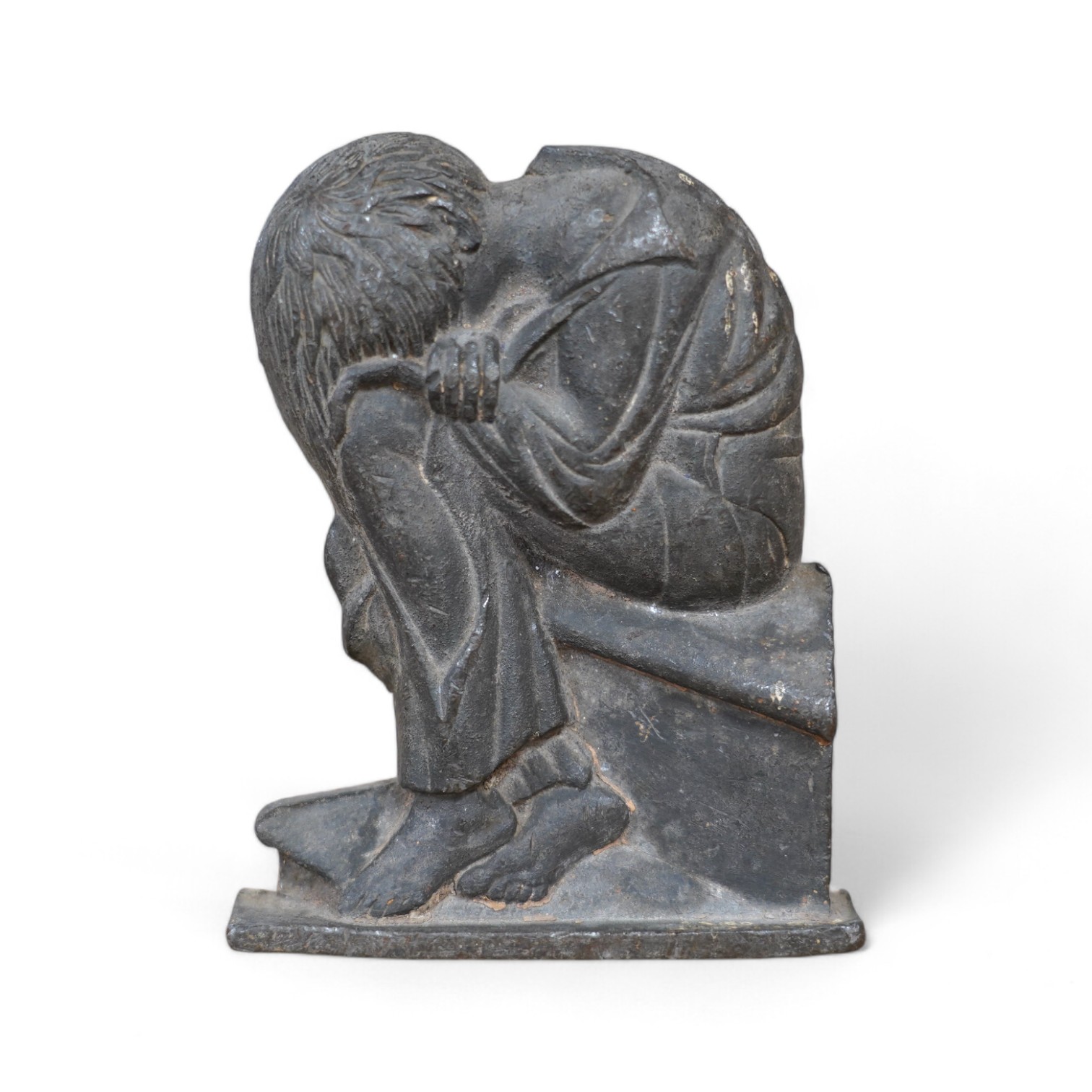 Follower of William Blake, a lead relief of a crouching figure, ex-studio of Fred Cuming, 15cm high. Condition - fair to good